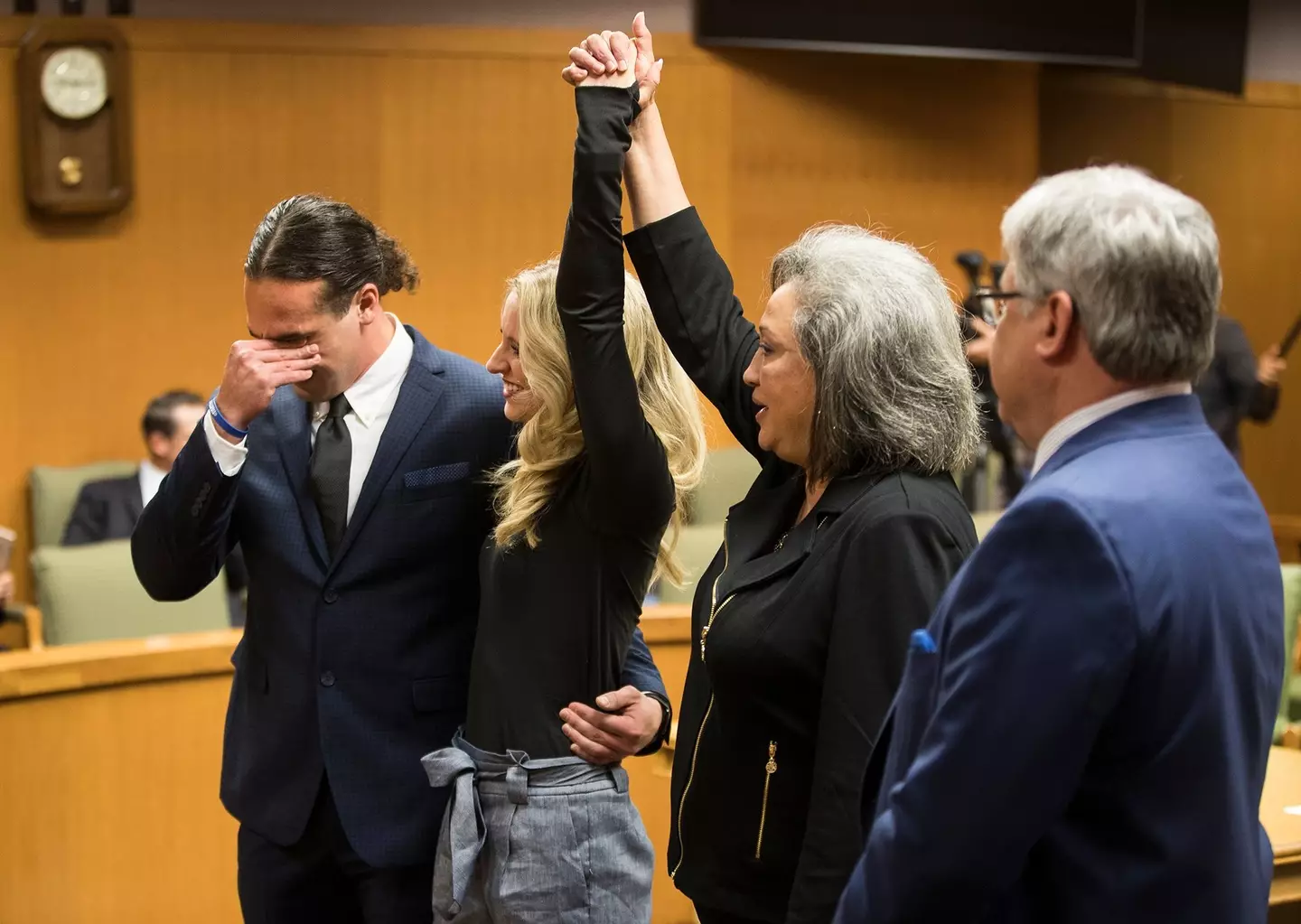 Greg wiped away tears as his fiancée celebrated the news of his exoneration (Ricardo B. Brazziell/The Austin American-Statesman via Getty Images)
