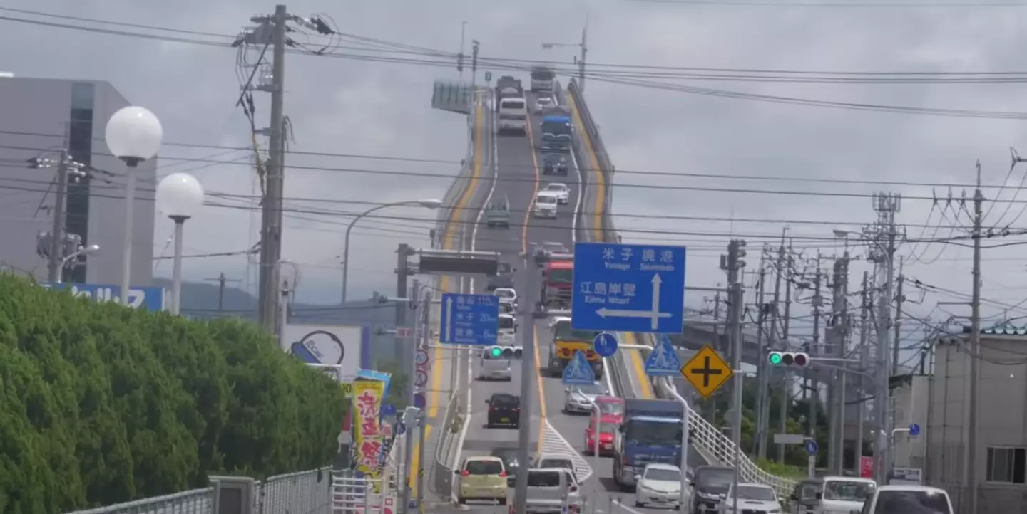 A man has cycled up Japan’s Eshima Ohashi bridge.