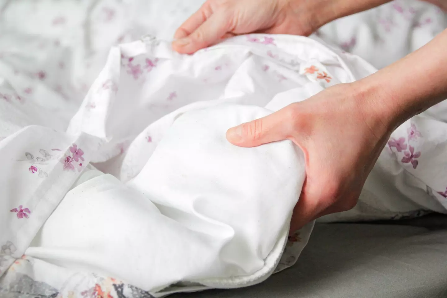 You're going to want to wash your bed sheets weekly (Getty Stock Photo)
