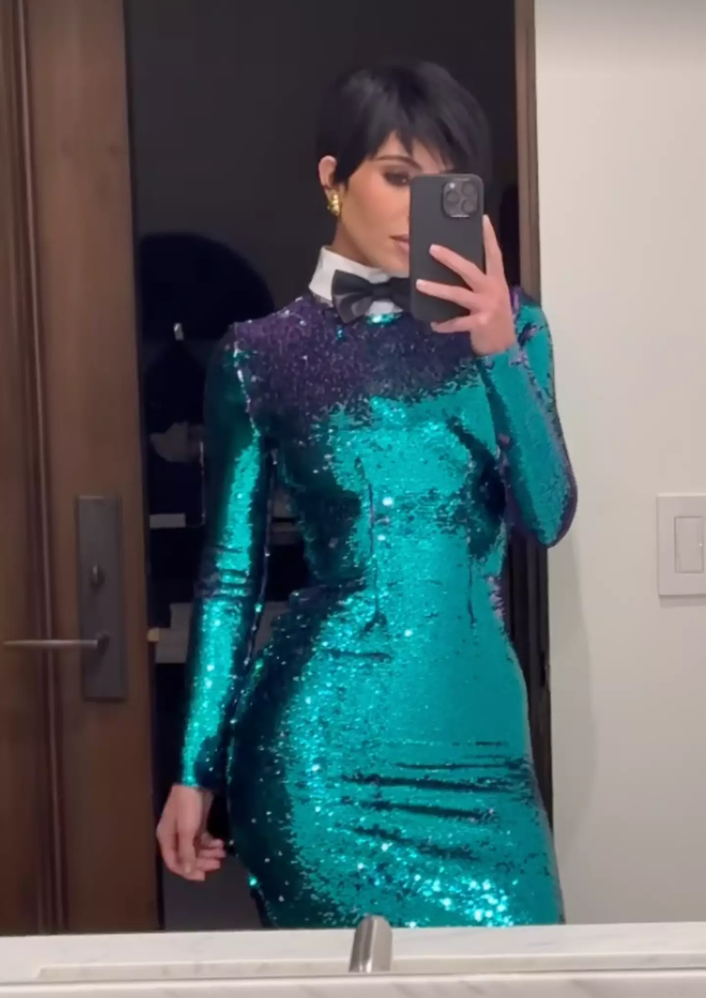 Kim was dressed up as 2011 Kris Jenner.