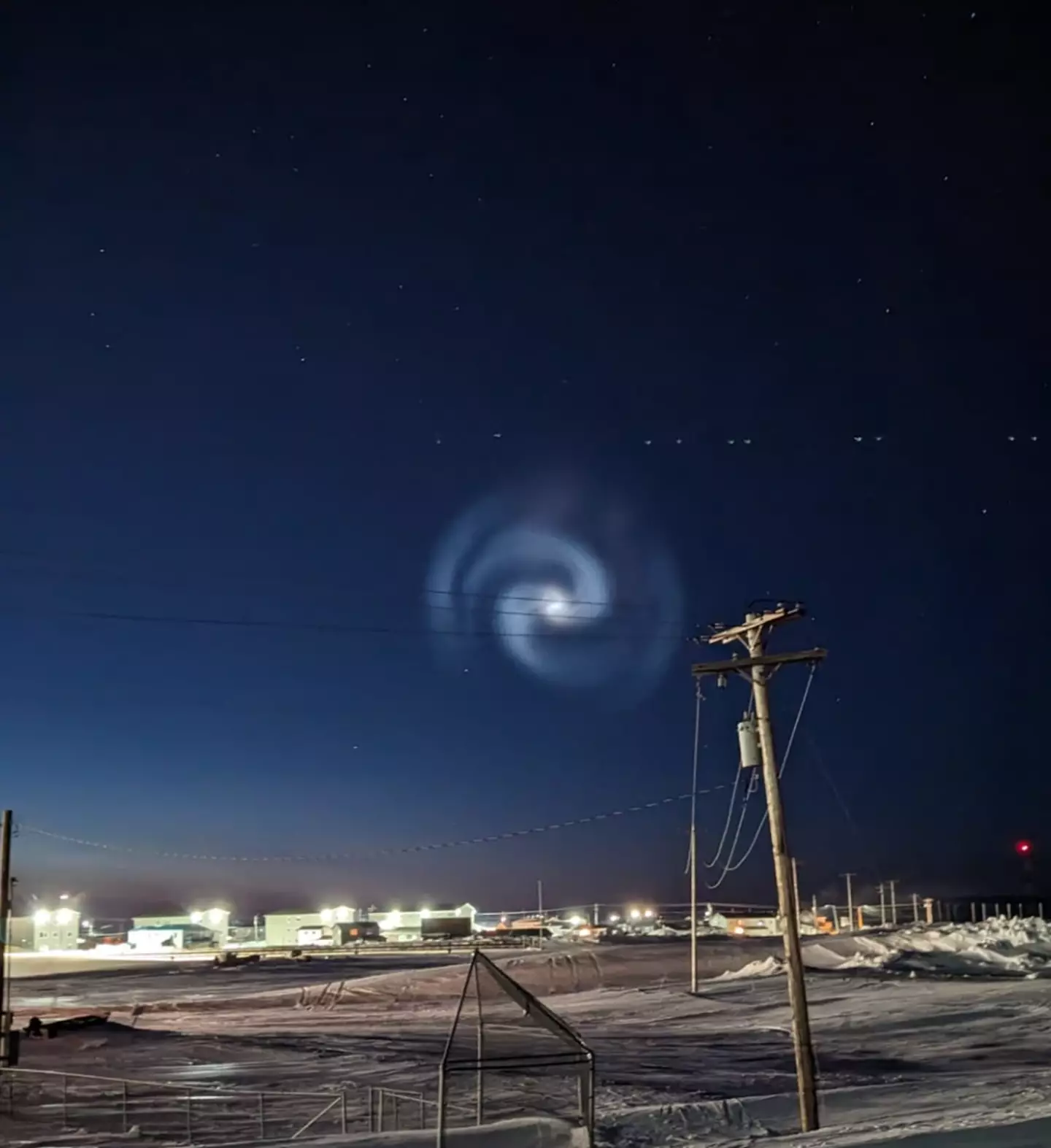 A mysterious giant spiral has left people in search of catching a glimpse at the famed northern lights utterly baffled.