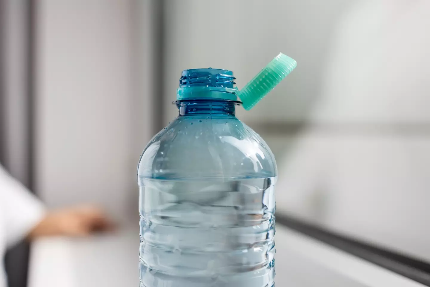 Bottle caps in Europe are now attached (Getty Stock Photo)