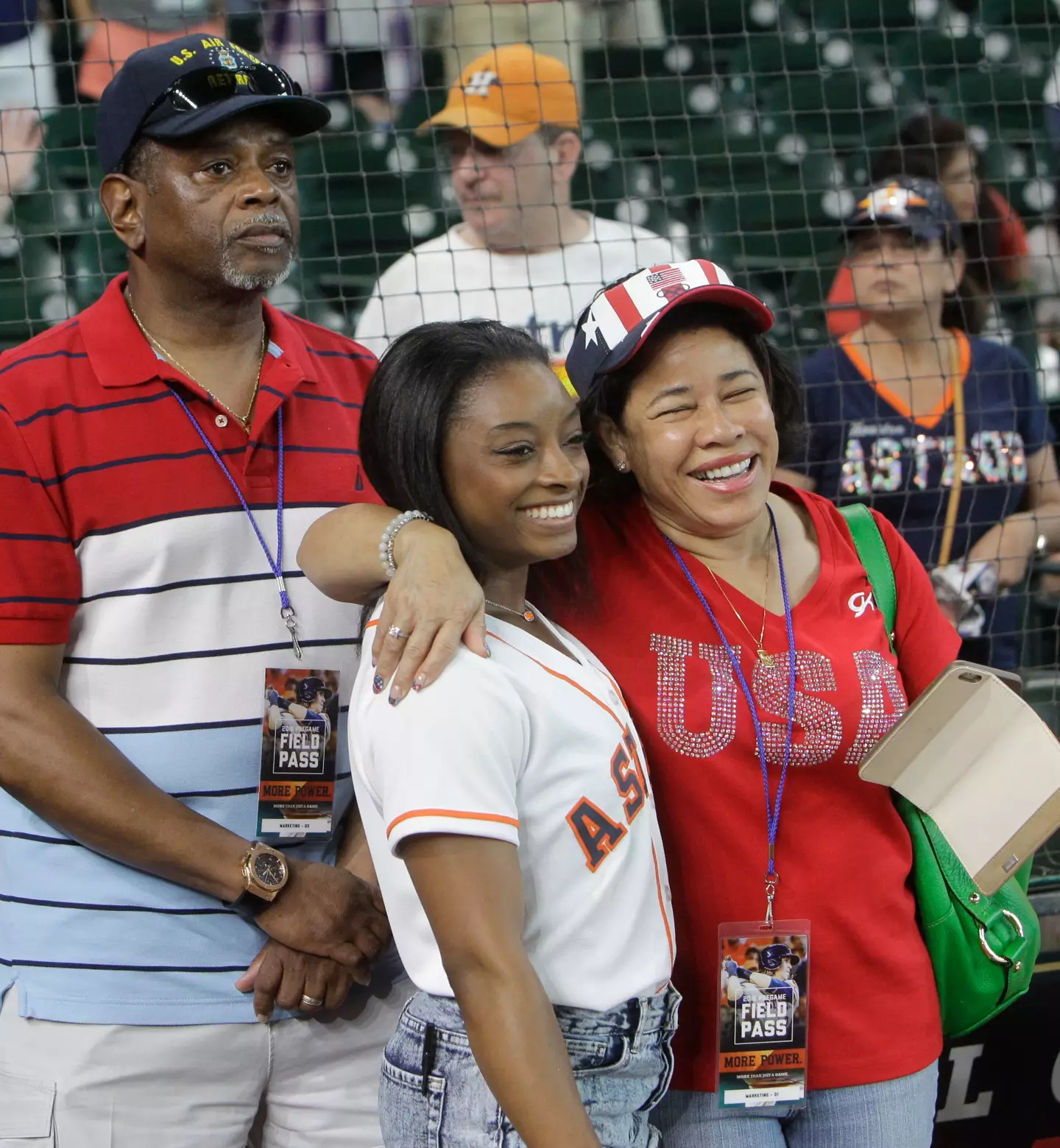 Simone seen with her adopted parents Ronald and Nellie Biles. (Melissa Phillip/Houston Chronicle via Getty Images)