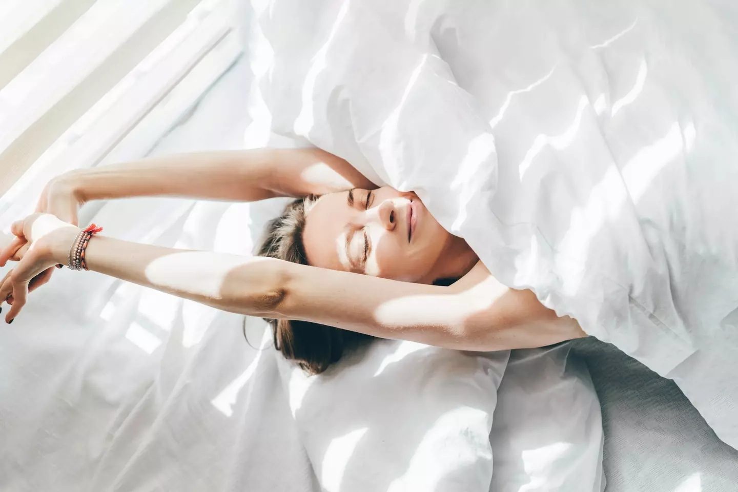 Sleeping naked has a whole range of benefits. CREDIT: maria korneeva/getty images 