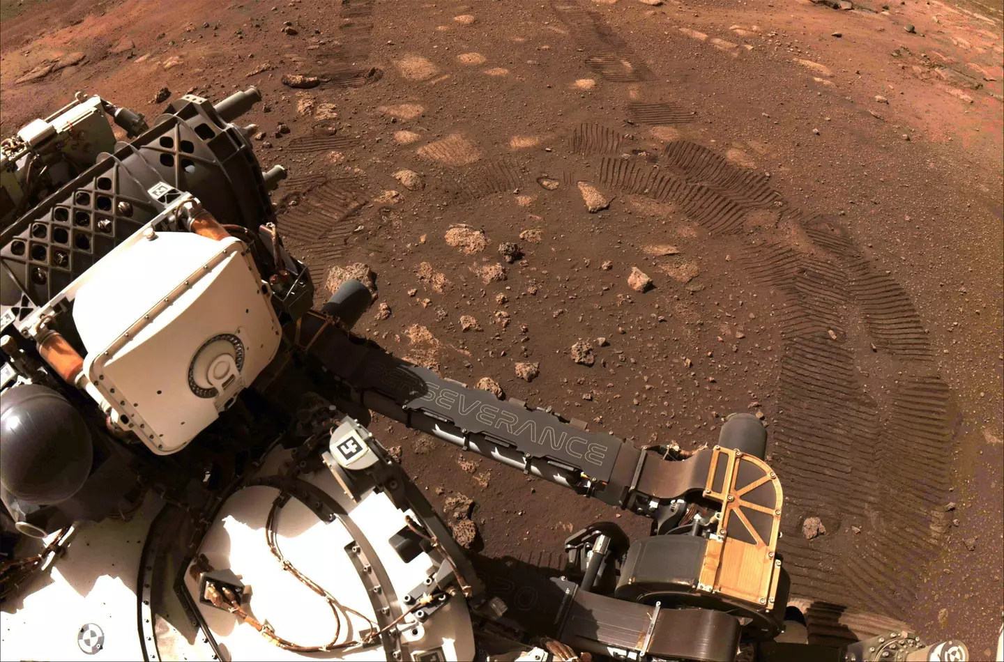 Perseverance roving on Mars during its first drive.