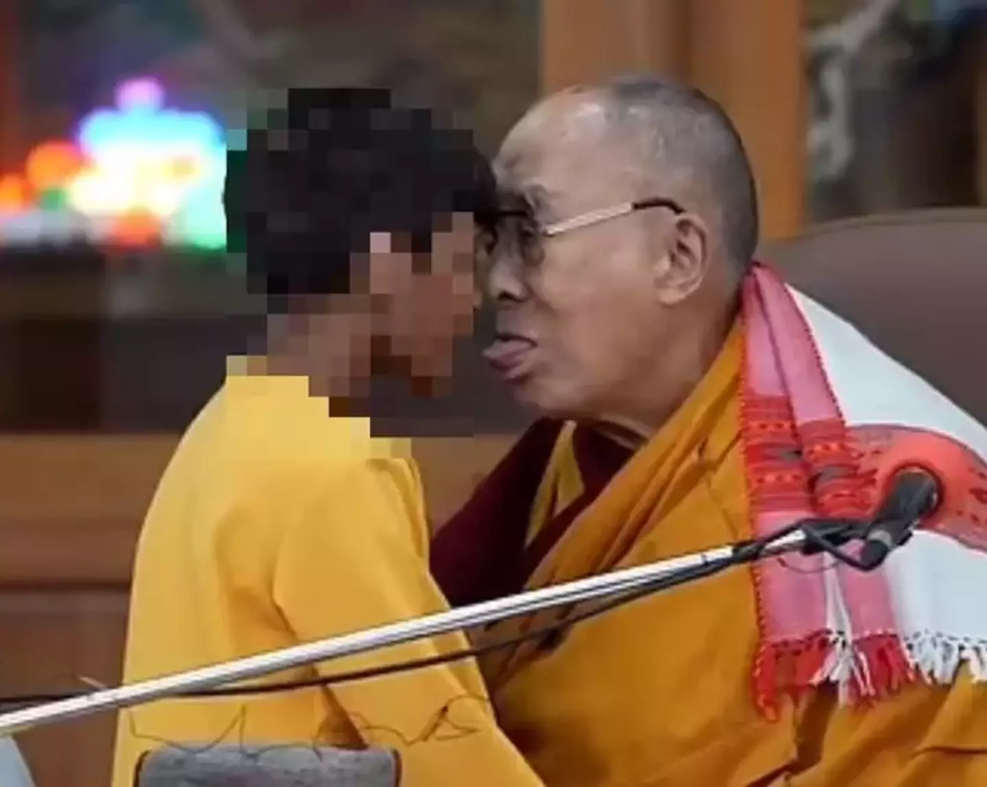 At one point, the Dalai Lama told the boy to 'suck' his tongue.