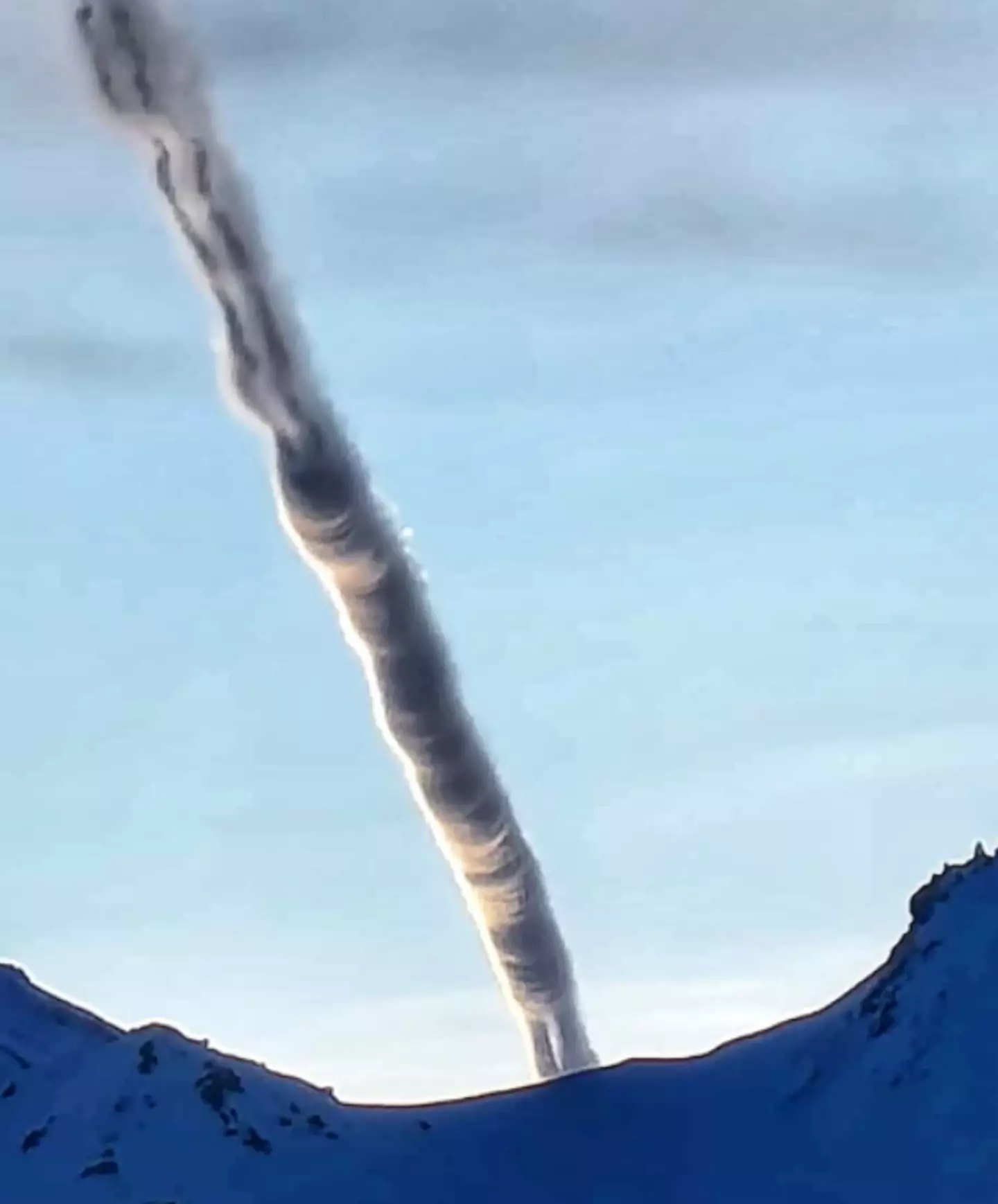 Conspiracy theorists have speculated whether the strange cloud in Alaska is a result of a plane crash, a UFO or rocket launch.