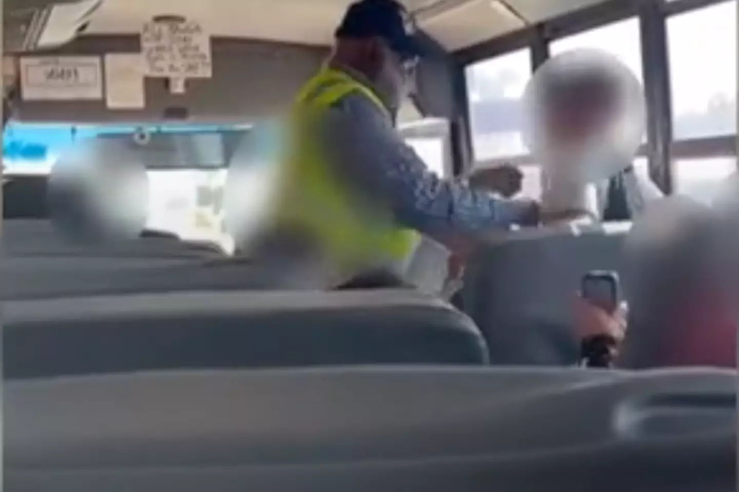 A bus driver was filmed in an altercation with a student.