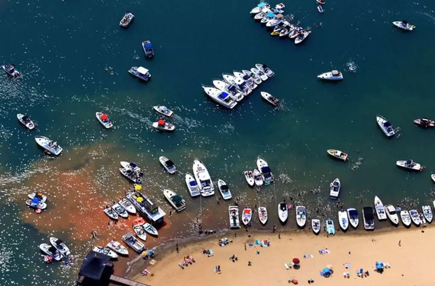 The lake is still a popular spot for water sports despite its history.