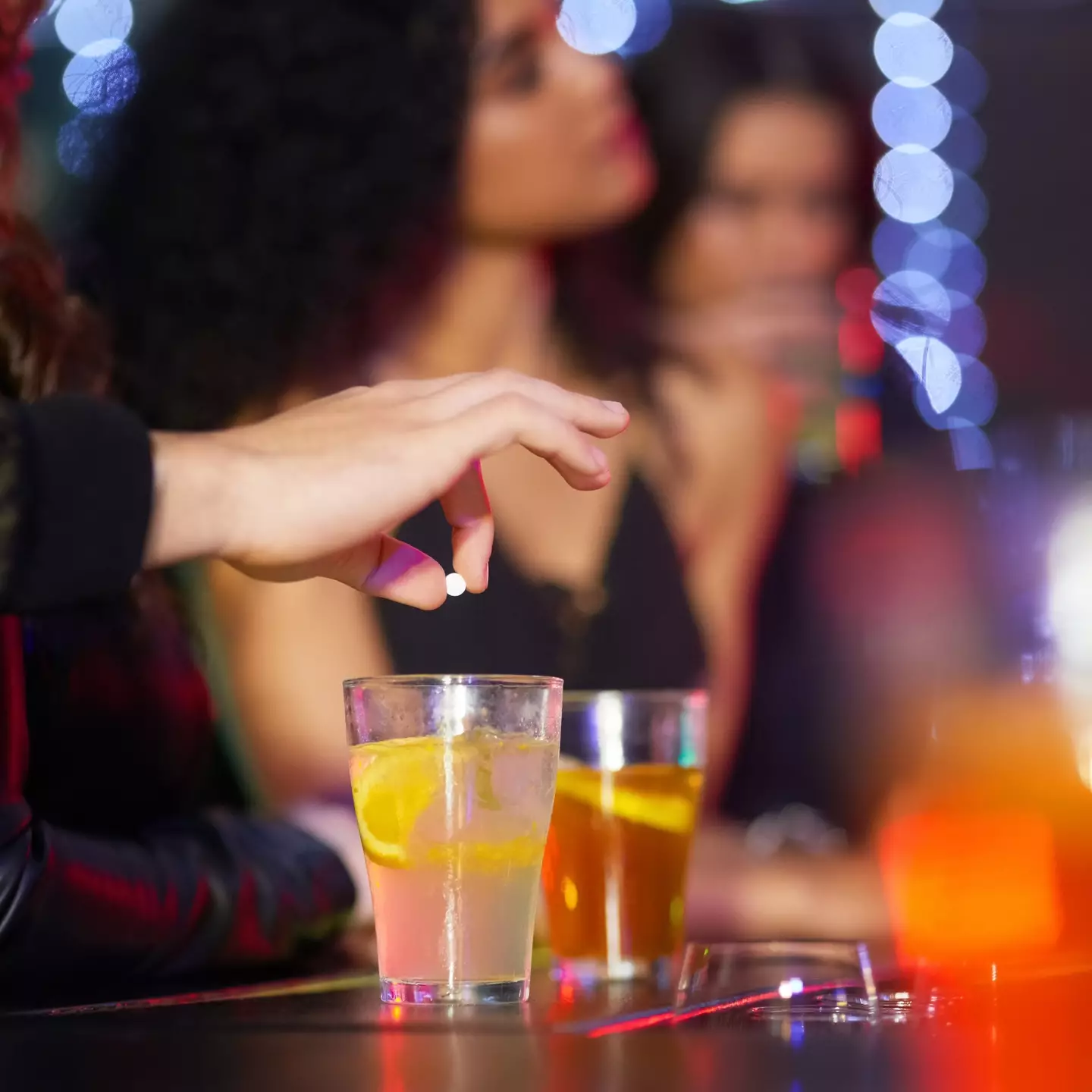 One in 13 students in America say they've been victims of drink spiking (Getty Stock Image)