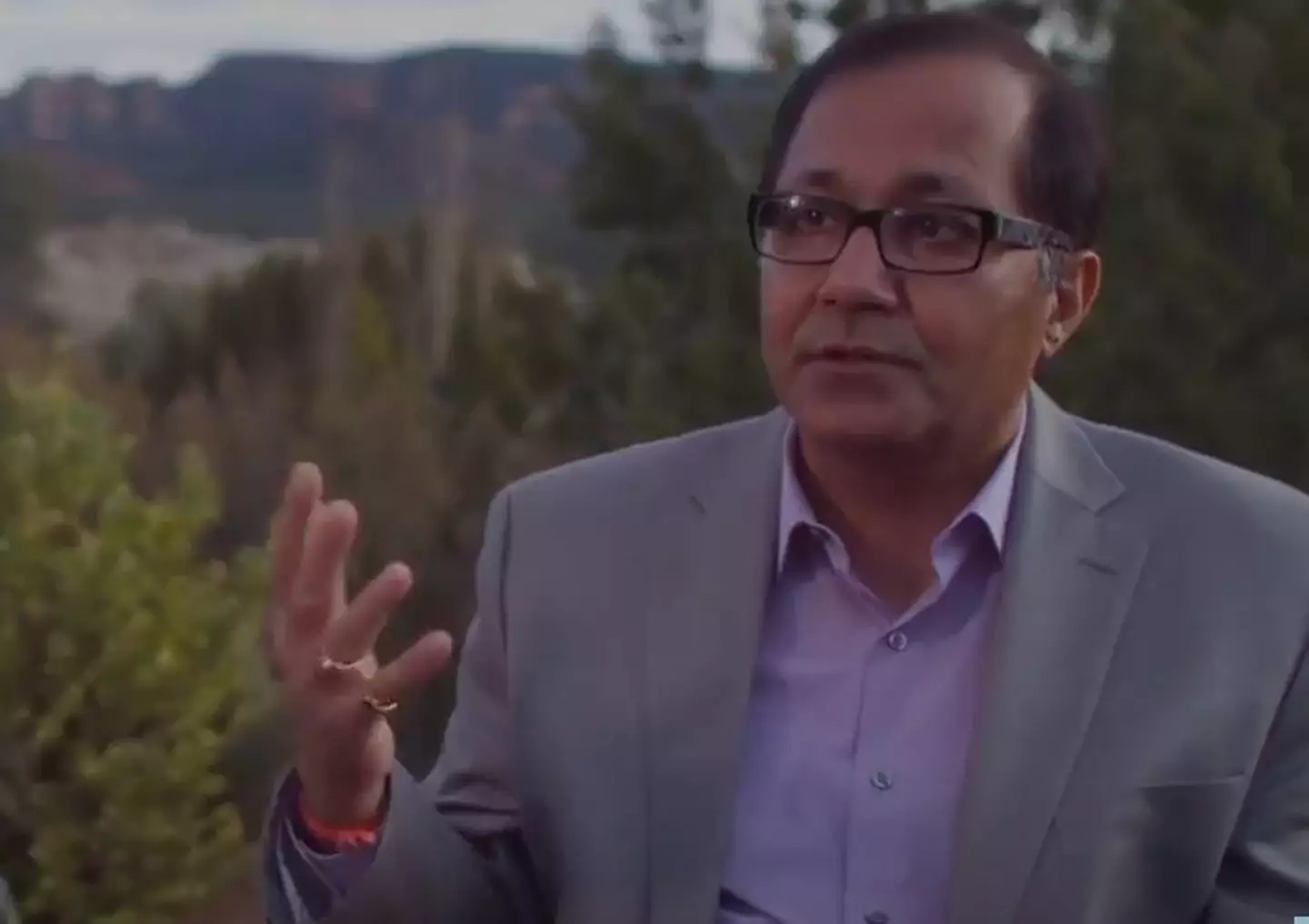 Dr Raj Parti has spoken extensively and written books about his near death experience(Raj Parti/YouTube)