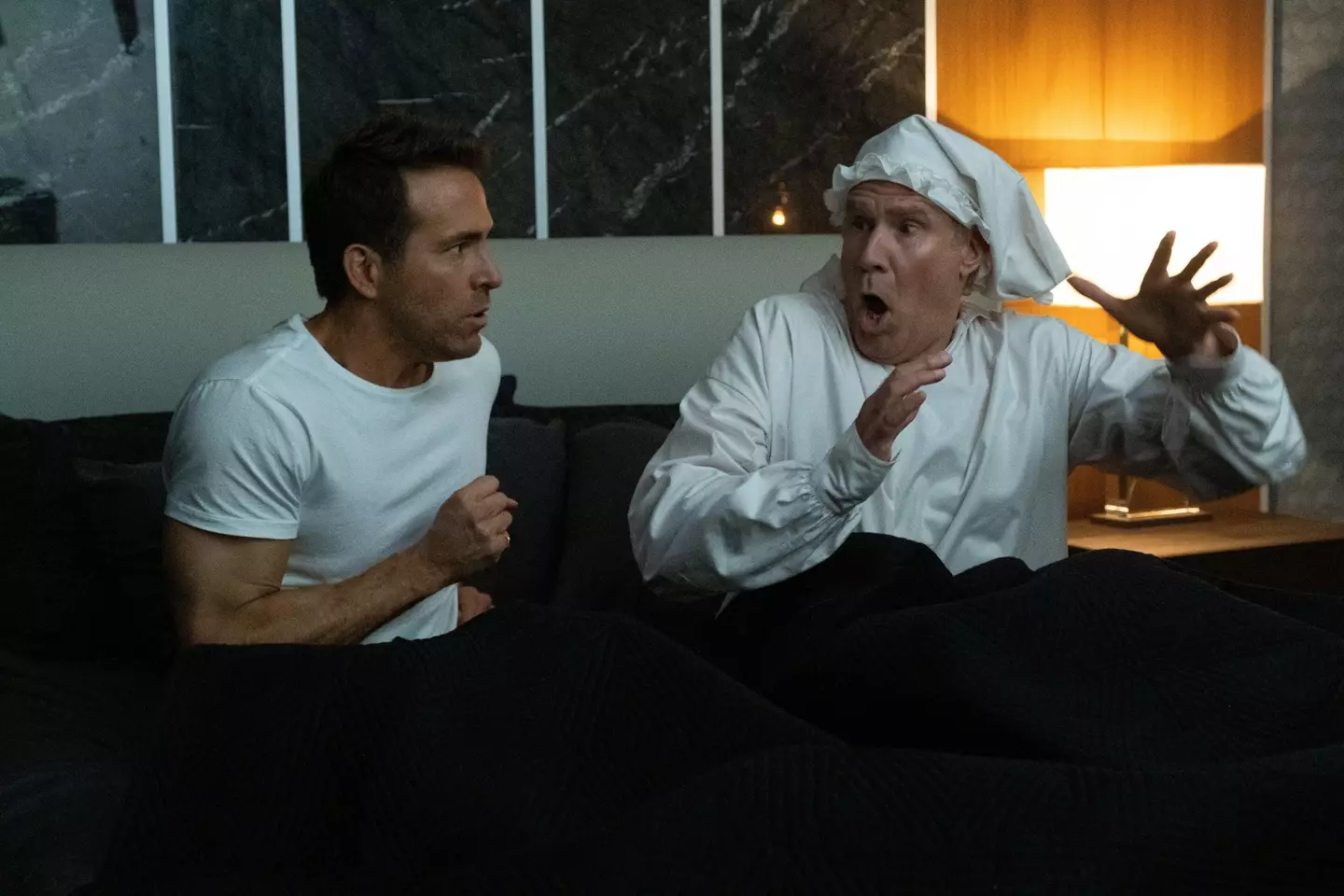 Ryan Reynolds and Will Ferrell star together in Spirited.