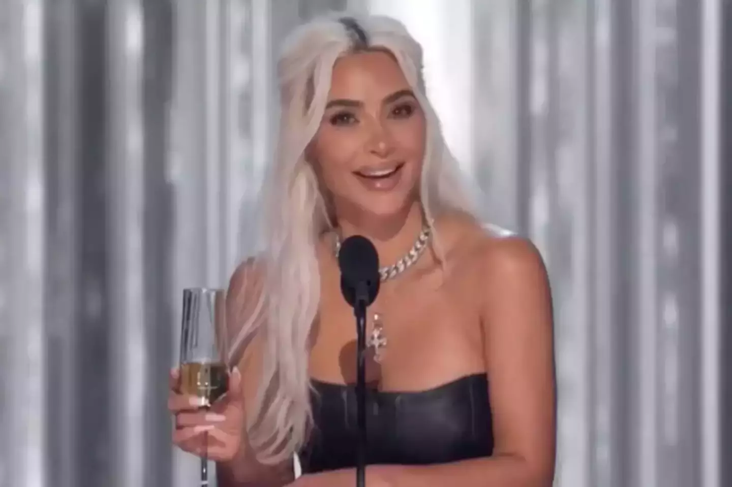 Kim Kardashian looked stunned at the audience as she was booed. (Netflix)