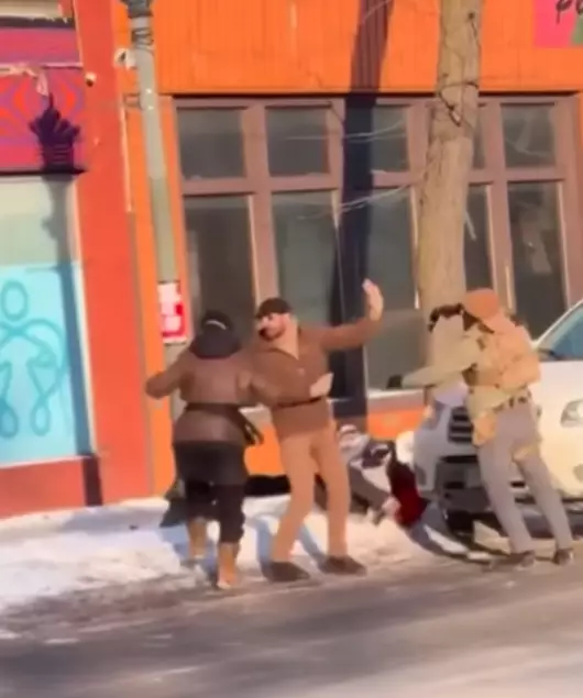 Pretti appeared to be trying to help a woman who was confronted by federal agents (NBC News)