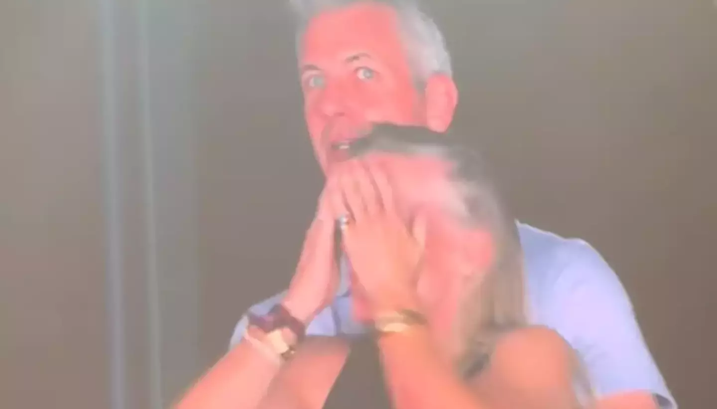 The pair quickly ducked out of view of the camera when they realized they were being shown to tens of thousands of people (TikTok)