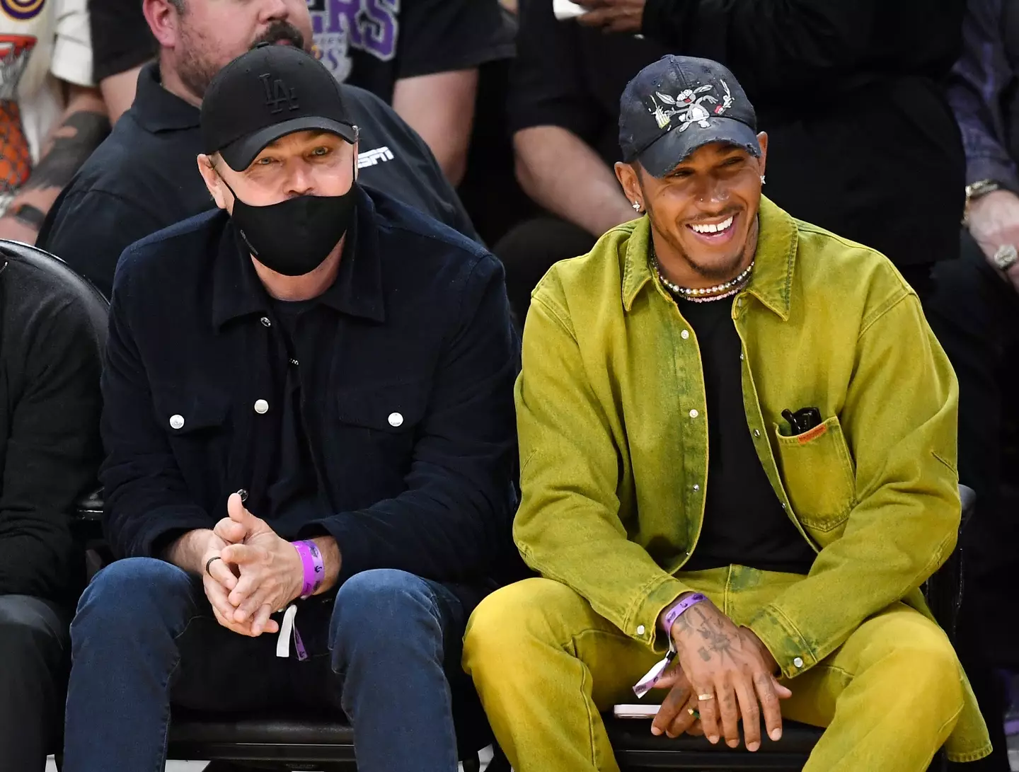 Leonardo DiCaprio (pictured here with Lewis Hamilton) has often favoured masks to stay out of the spotlight (Kevork Djansezian/Getty Images)
