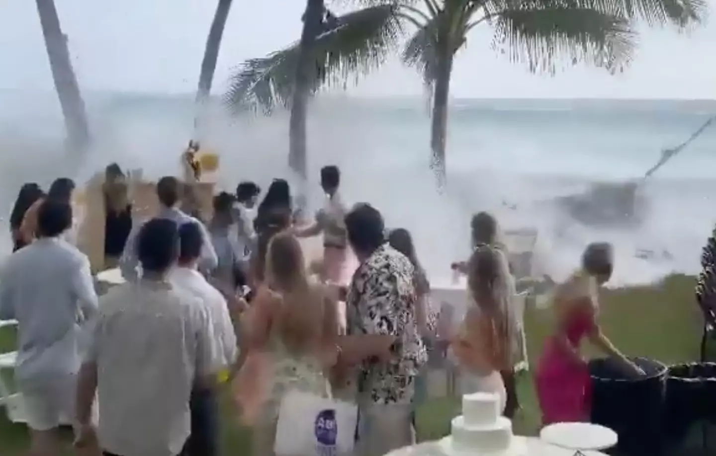 The huge wave interrupted a ceremony in Hawaii.