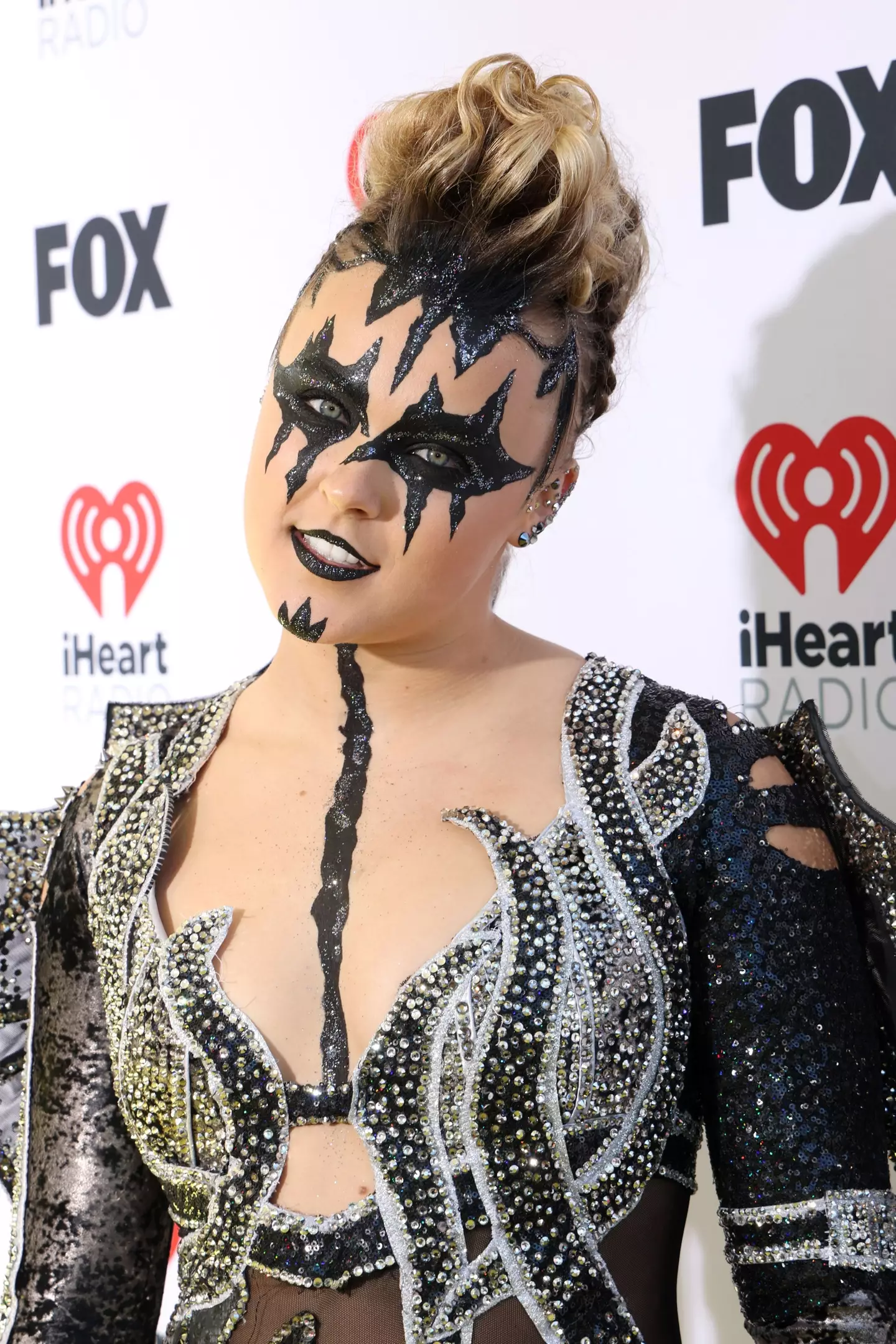 JoJo Siwa has rebranded herself for her upcoming single Karma. (Kevin Mazur/Getty Images for iHeartRadio)