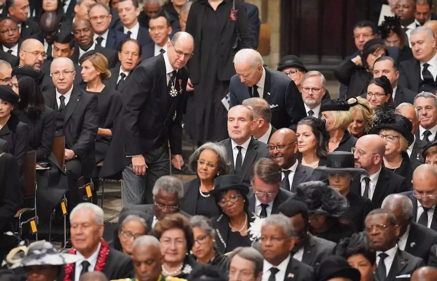 US President Joe Biden has been given an aisle seat 14 rows back.