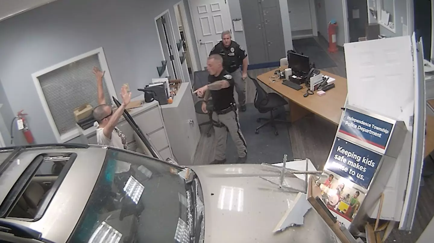 The 34-year-old appeared to celebrate before being apprehended by officers.