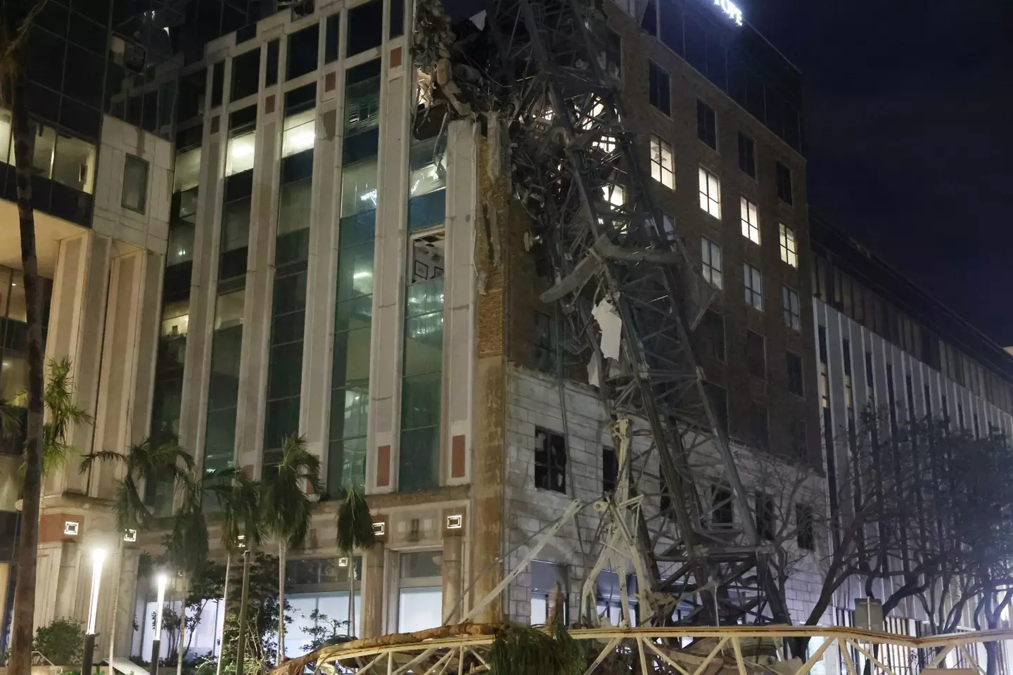 Milton knocked a crane into a building in St Petersburg (Spencer Platt/Getty Images)