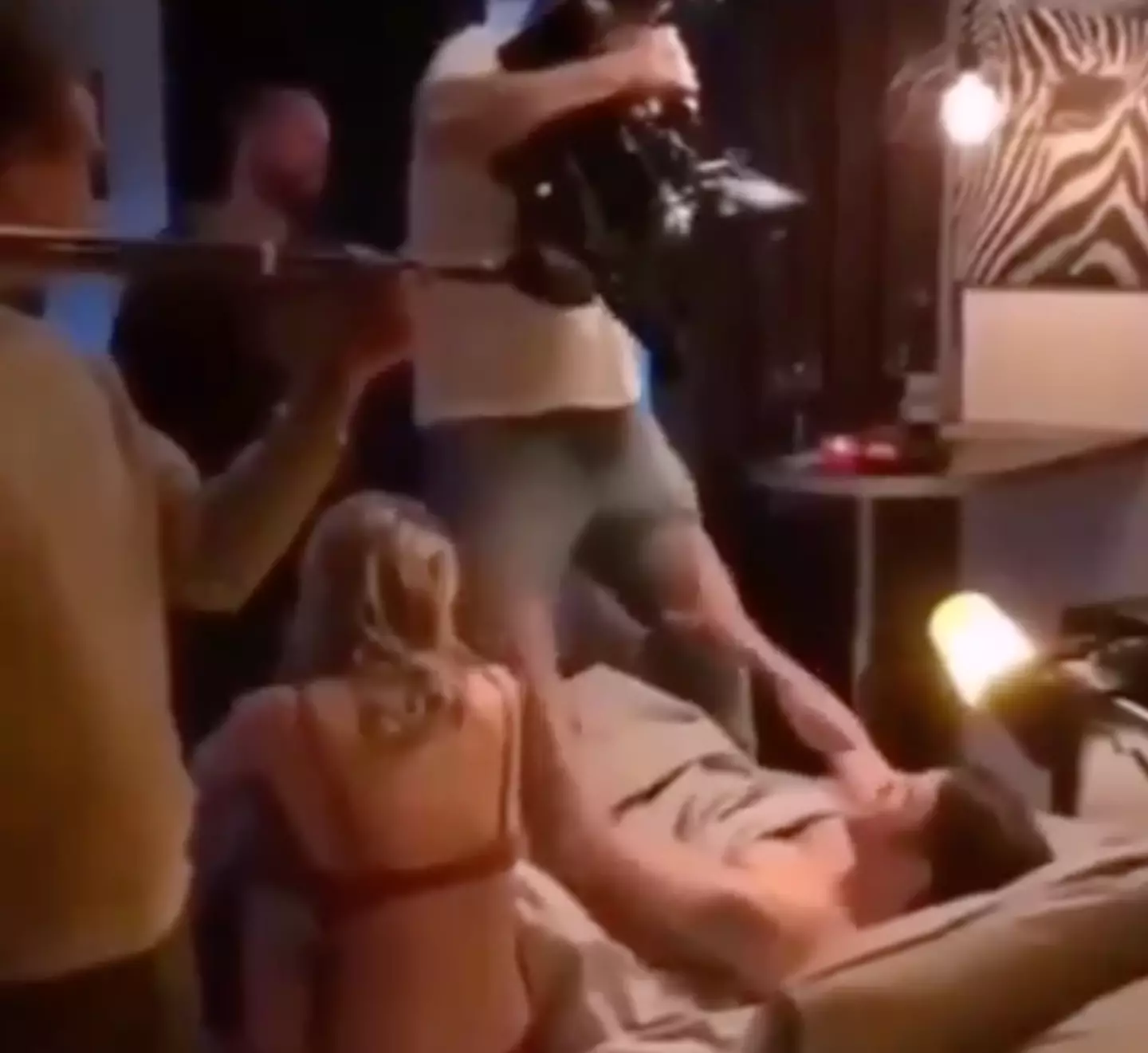 In the clip the male actor is seen lying on a bed, position between the cameraman’s legs as he stands above and points the camera at the guy. (interesting_aIl/X)