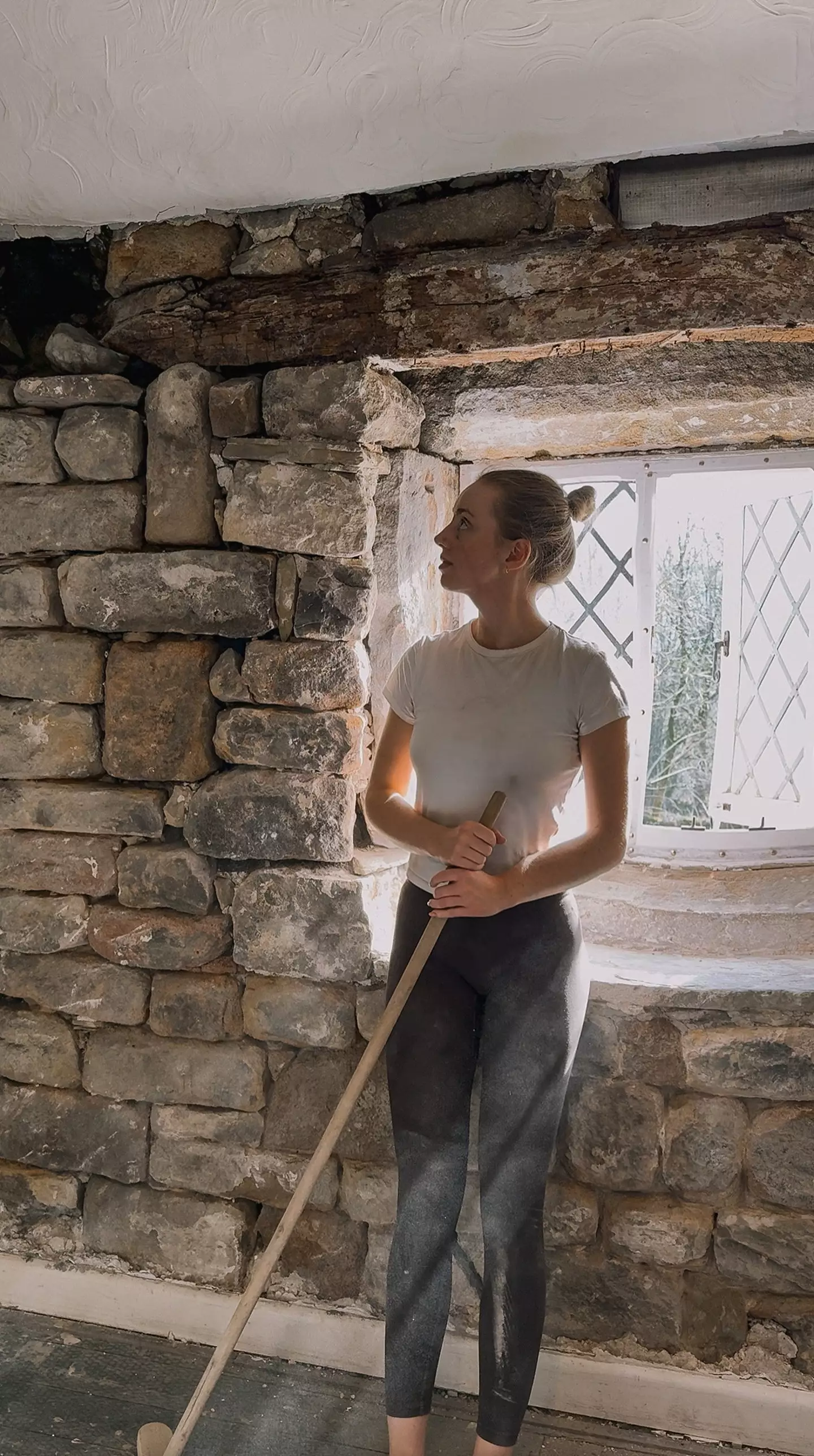 Emmie opted to remove the rendering herself after being quoted £17k by professionals (SWNS)