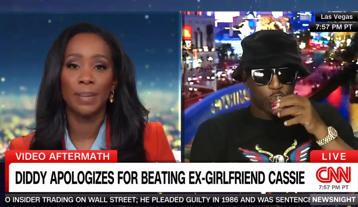 Cam'ron flashed a look of his drink's label (CNN)