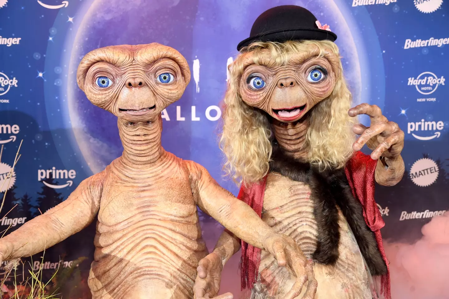 The costumes are inspired by E.T. The Extra Terrestrial (Noam Galai/Getty Images for Heidi Klum Halloween)
