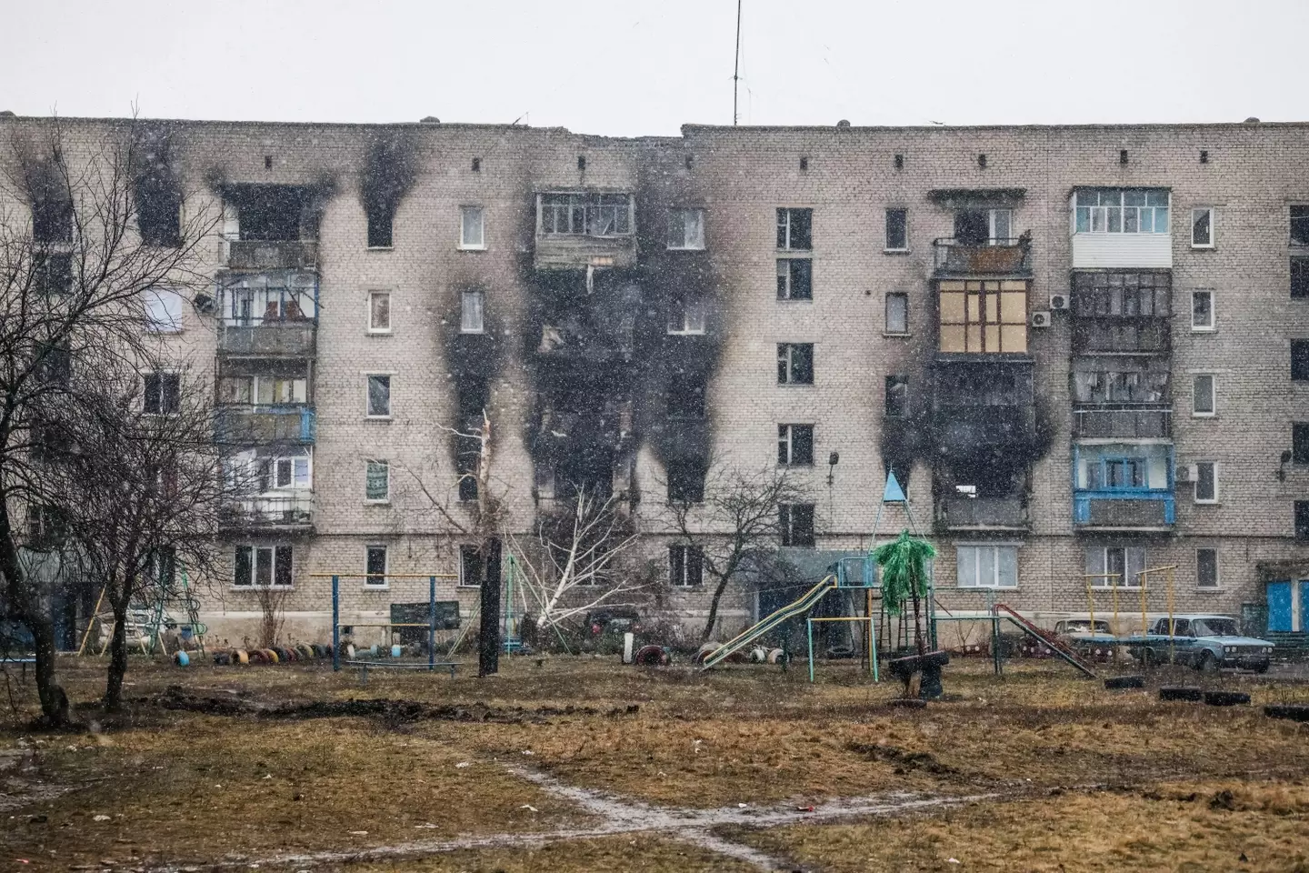 Apartment buildings damaged in shell attacks (Alamy)