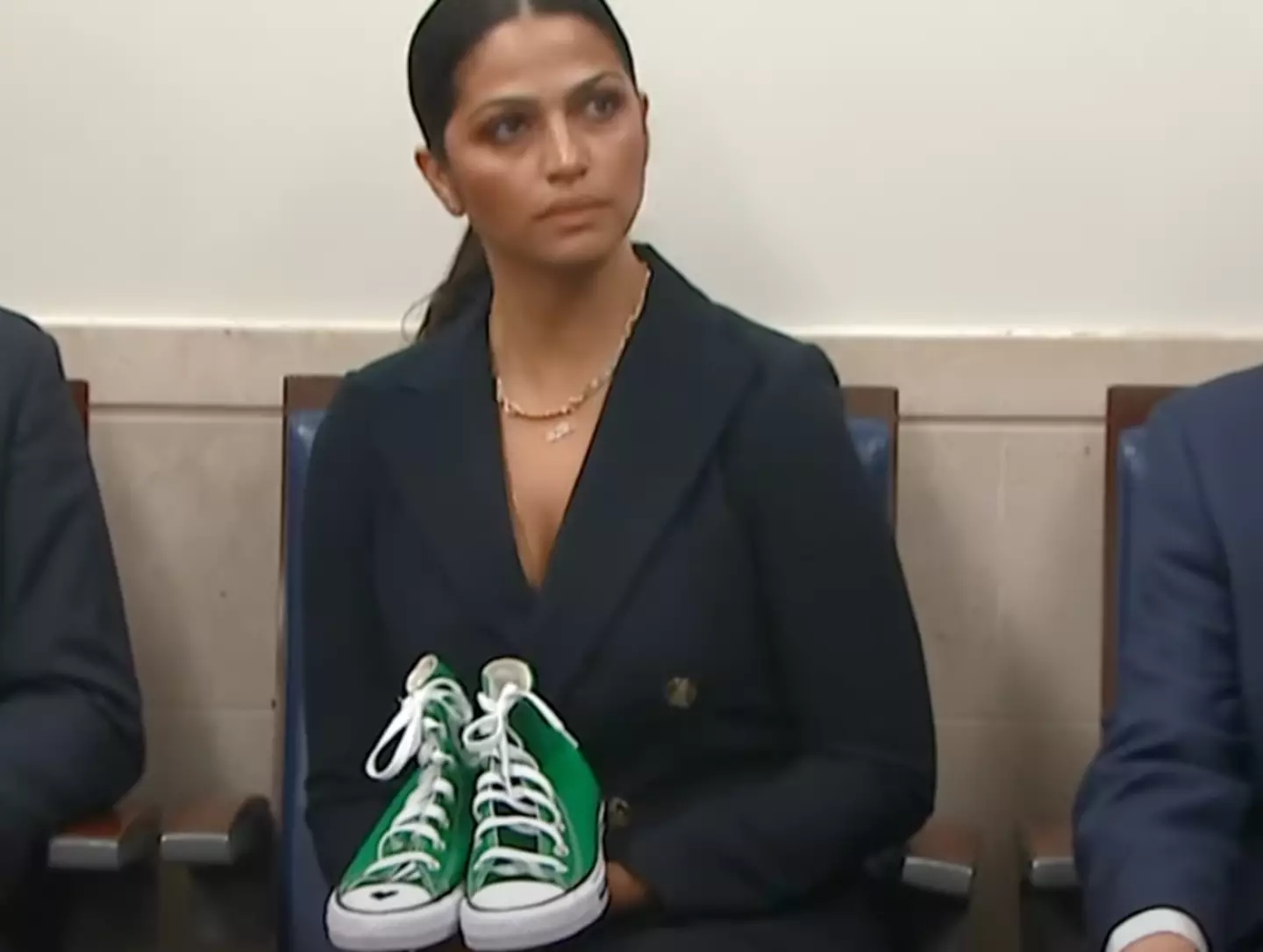 Green converse worn my Maite Rodriguez.