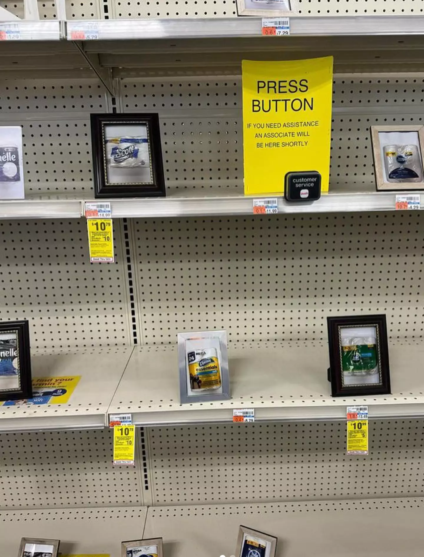 The CVS store now has photographs of its toilet roll products on its shelves.