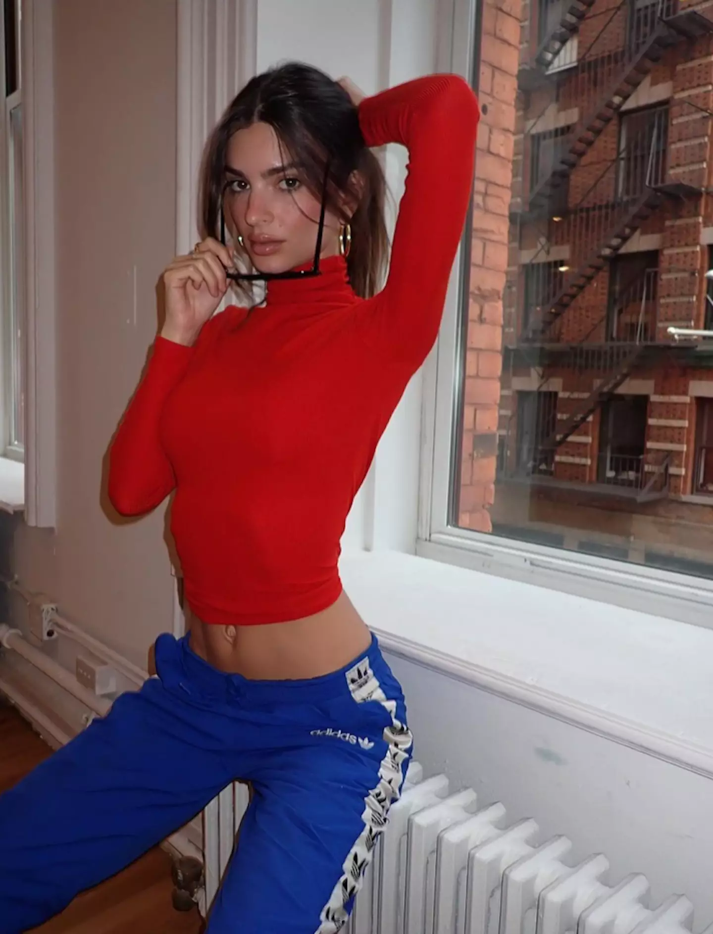 Emily Ratajkowski says she doesn't 'really believe in straight people' as 'sexuality is on a sliding scale'.