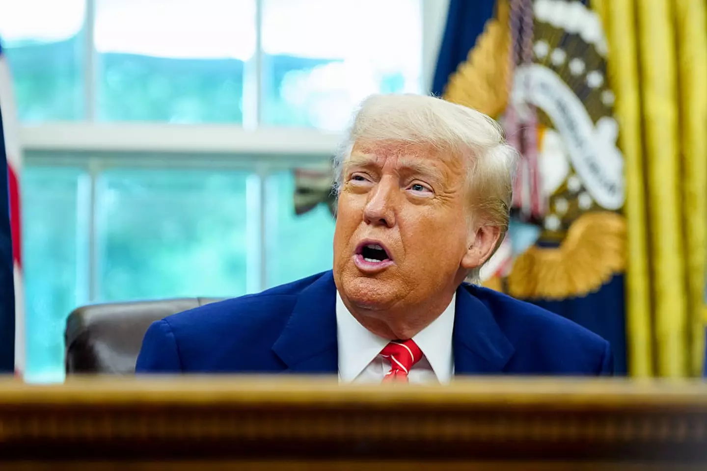 President Donald Trump has taken a swipe at Putin for 'celebrating World War II' (Bonnie Cash/UPI/Bloomberg via Getty Images)