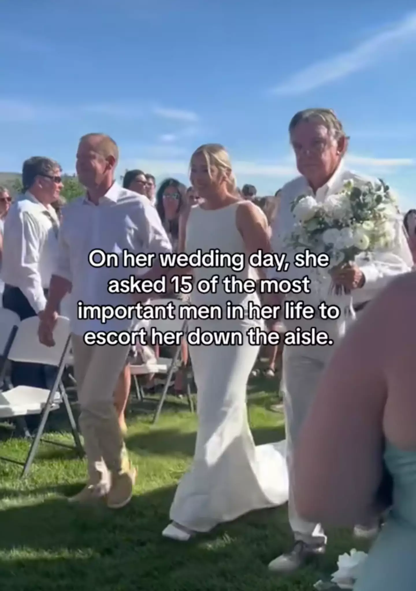 Ivy was walked down the aisle by 15 different men.
