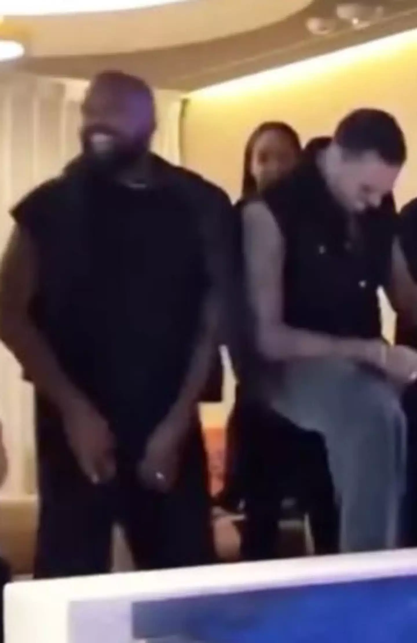 Both West and Brown were seen dancing to the track.