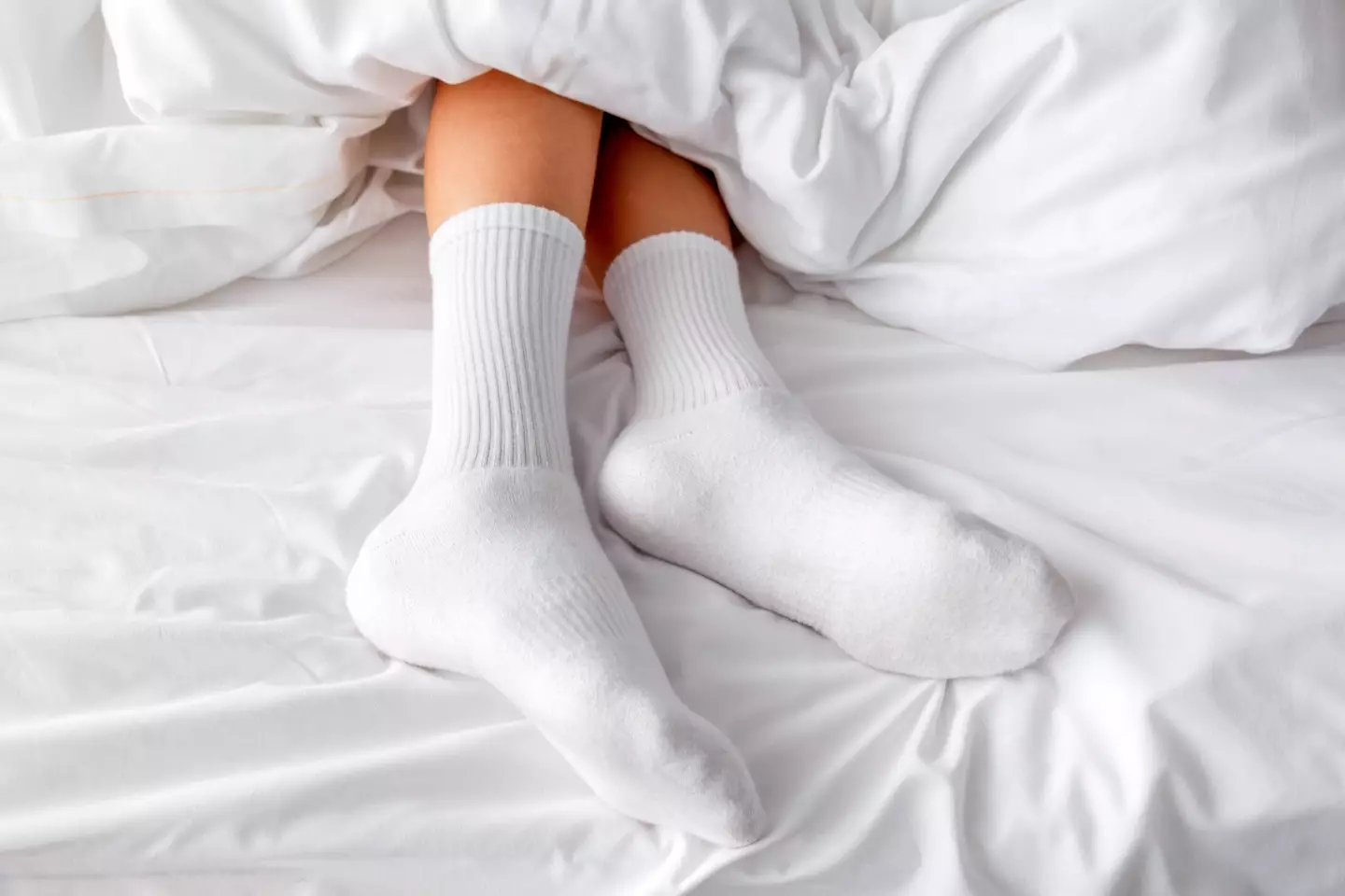 Experts reveal 'disgusting' reason why you should never wear socks to bed