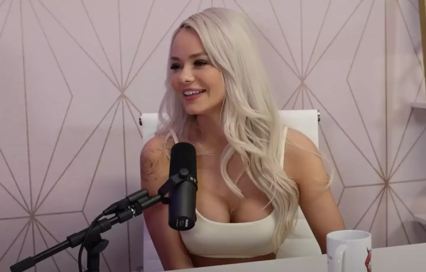 Elsa Jean revealed the 'sick' way her family found out about her porn career. (Holly Randall Unfiltered/YouTube)