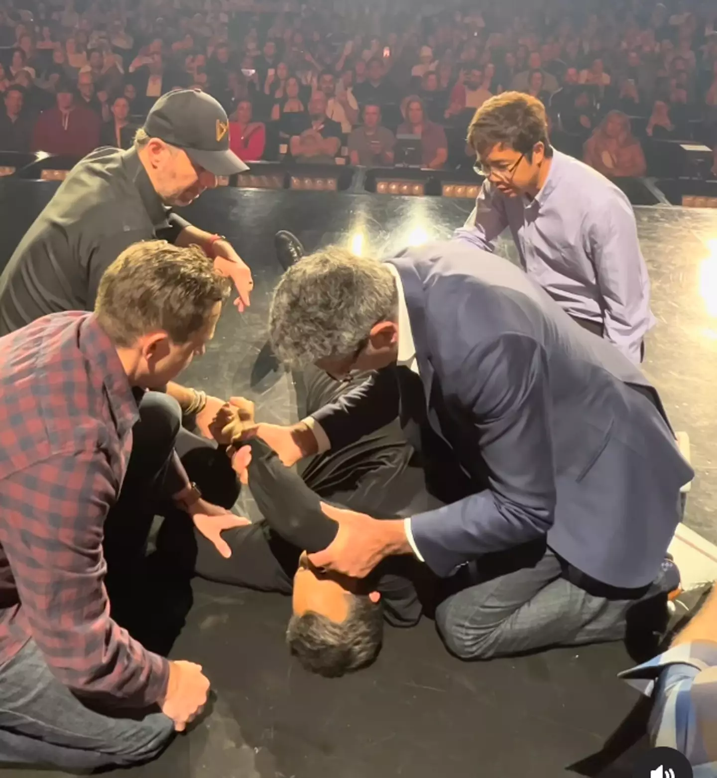 Doctors from the crowd treated him on stage.