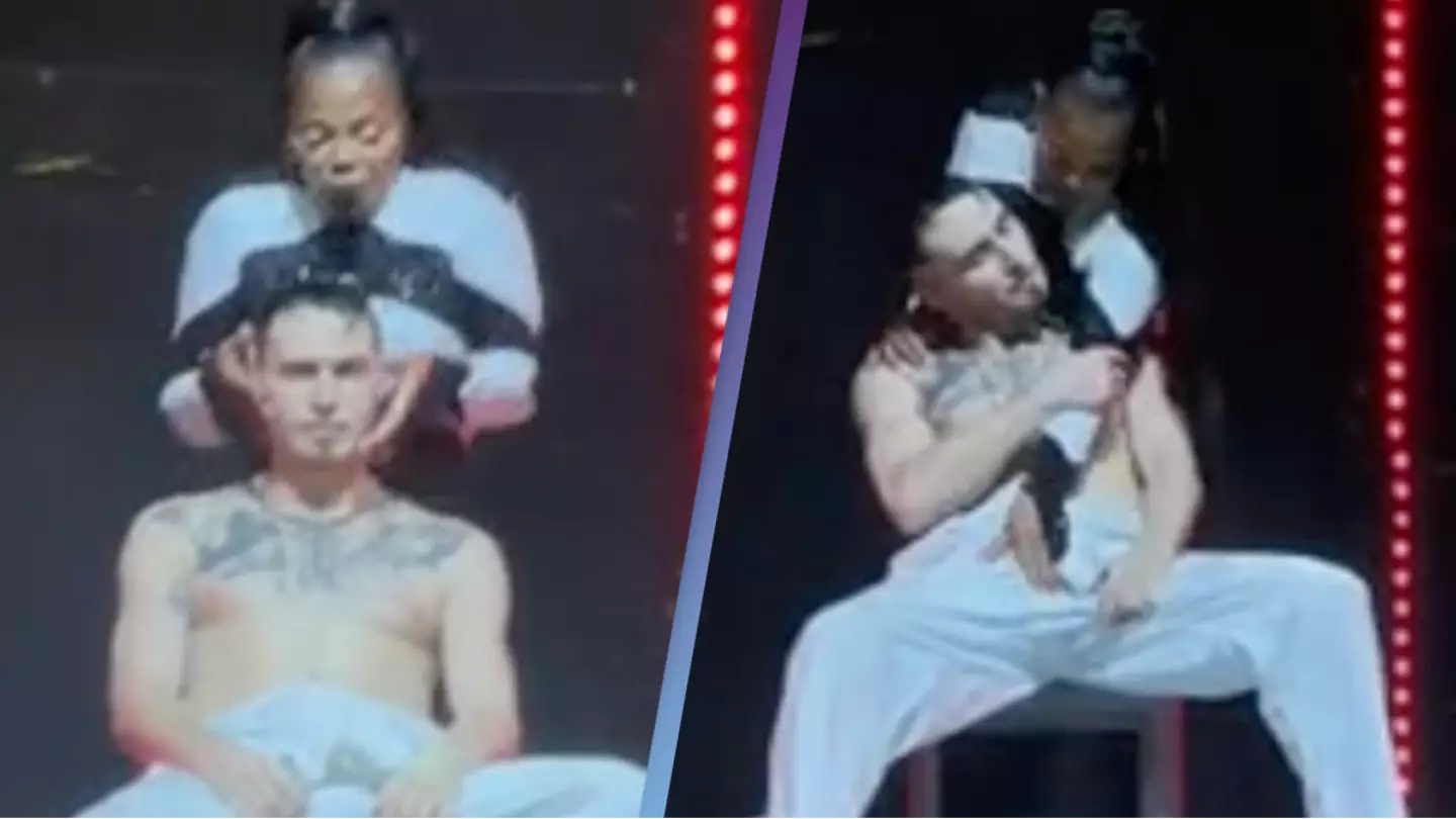 Janet Jackson grabs dancer's crotch during performance