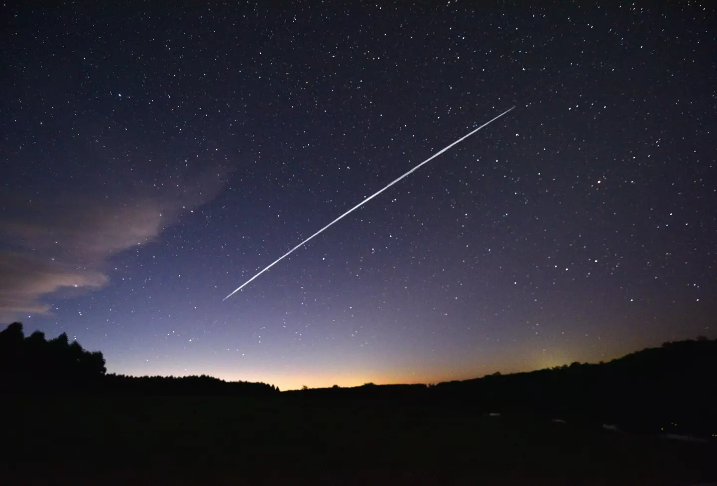 A group of Starlink satellites spotted over Uruguay (MARIANA SUAREZ/AFP via Getty Images)