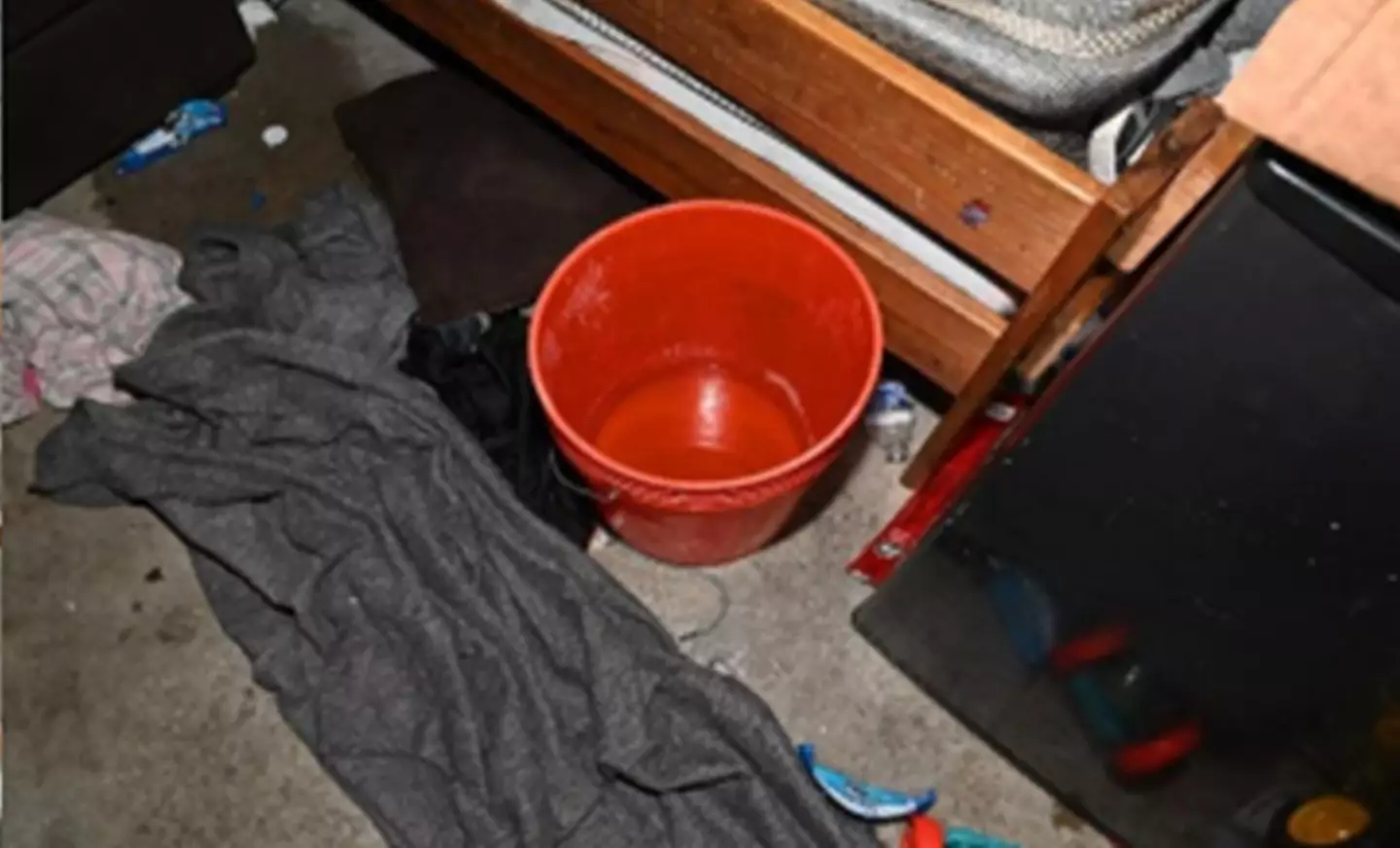 There was no bathroom, only a bucket (Milwaukee Sheriff's Office)