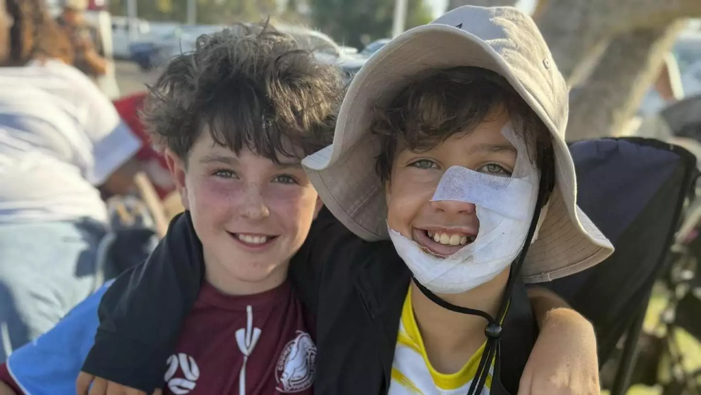 Lucas pictured smiling with his futsal teammate just a matter of weeks after the incident took place (GoFundMe)