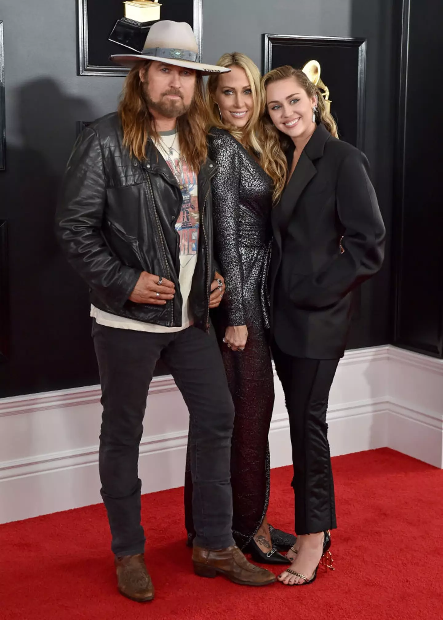 Miley with her parents at the 2019 Grammys.