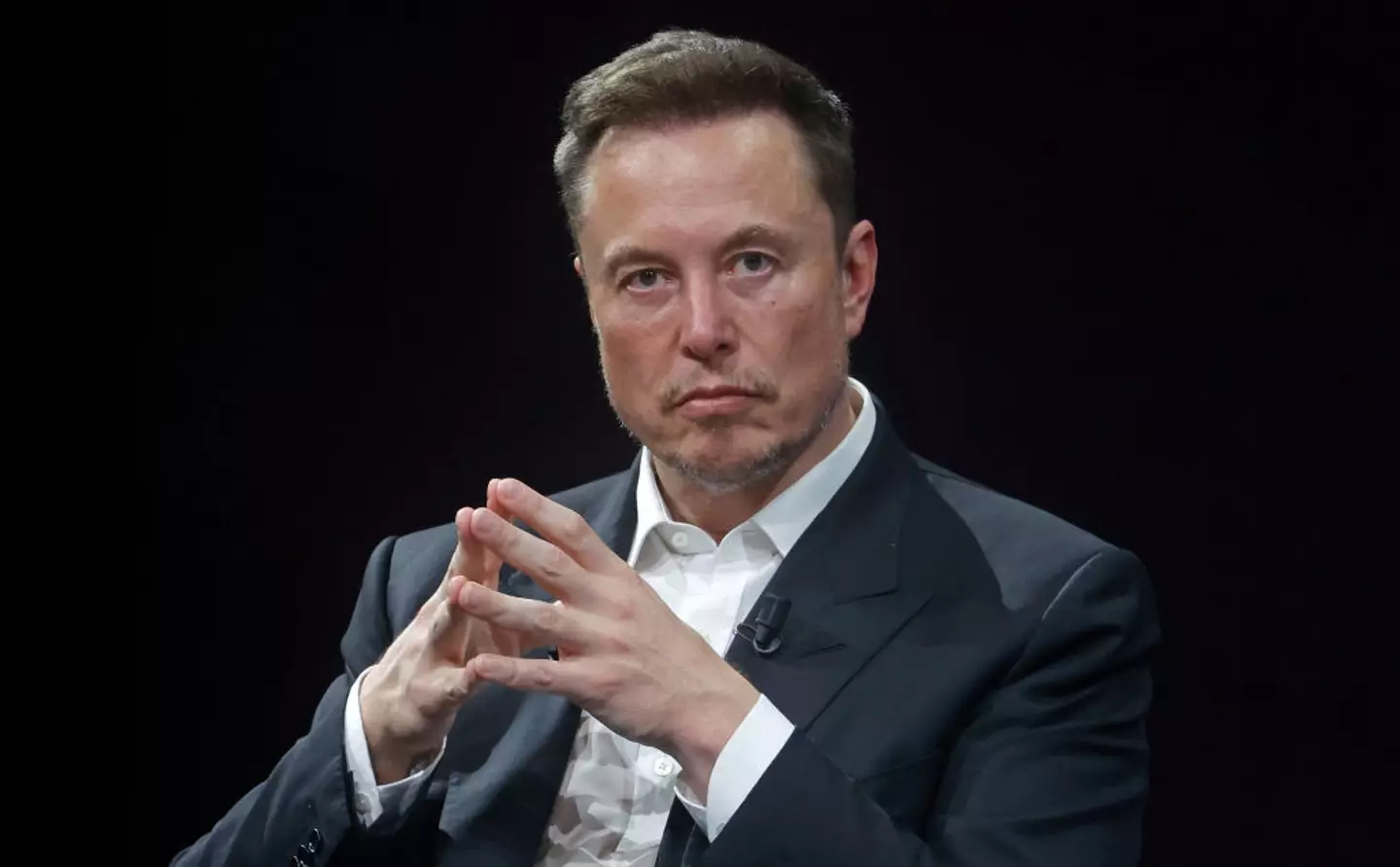 Elon Musk promoted Grok after OpenAI removed its share feature (Chesnot/Getty Images)