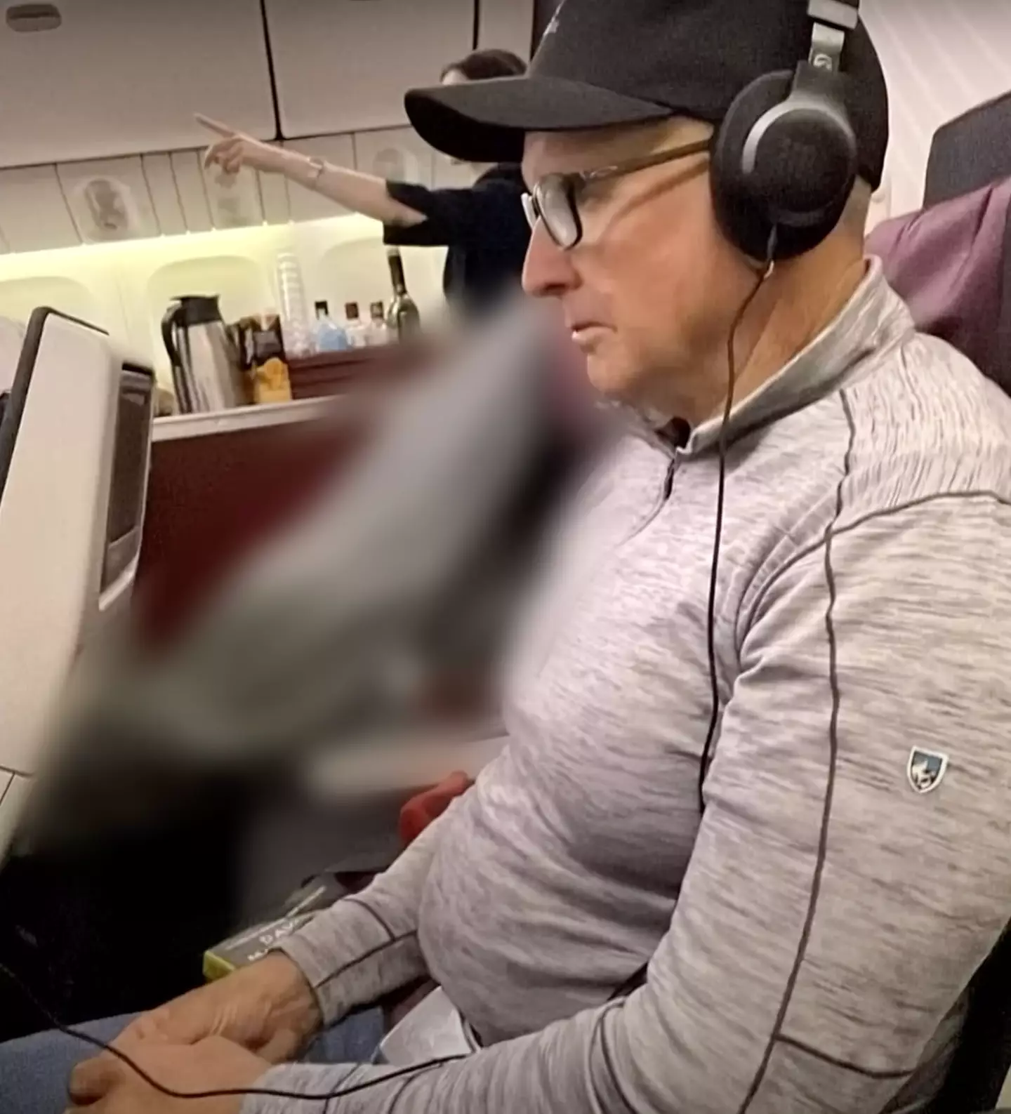 Mitchell Ring claims he was forced to sit on the same row as a passenger who died during a flight (YouTube/A Current Affair)
