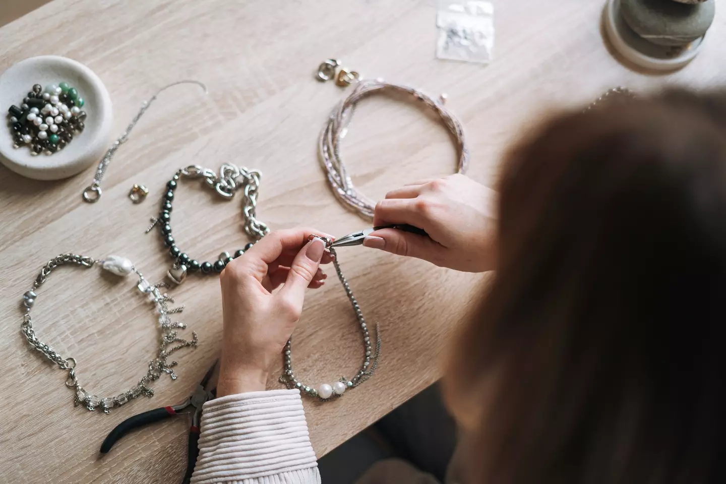 The man was wearing a metallic necklace (Getty Stock Photo)