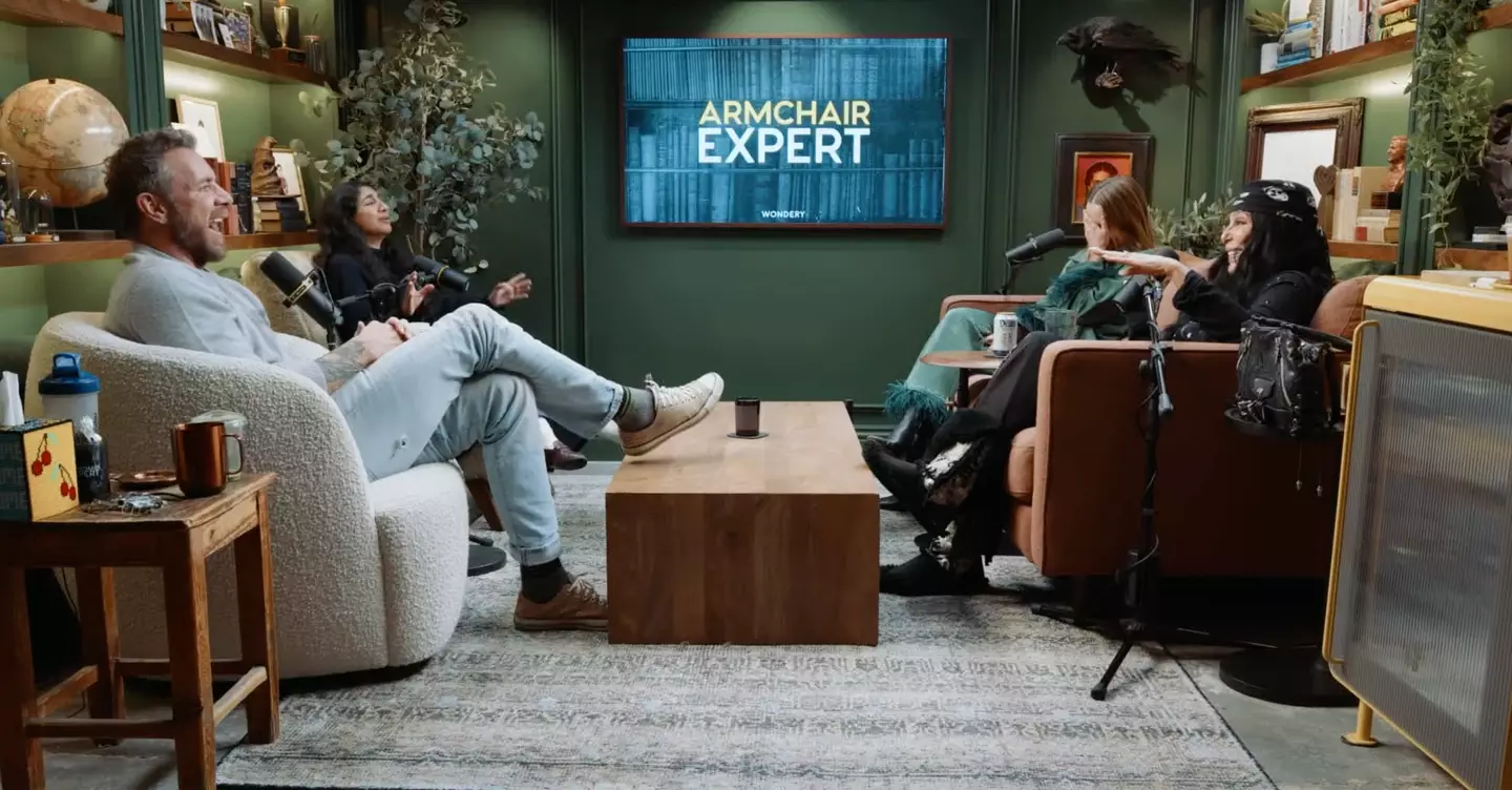 Kristen Bell's hand was in her face after Cher made a savage dig at her husband Dax Shepard (YouTube/Armchair Expert with Dax Shepard)