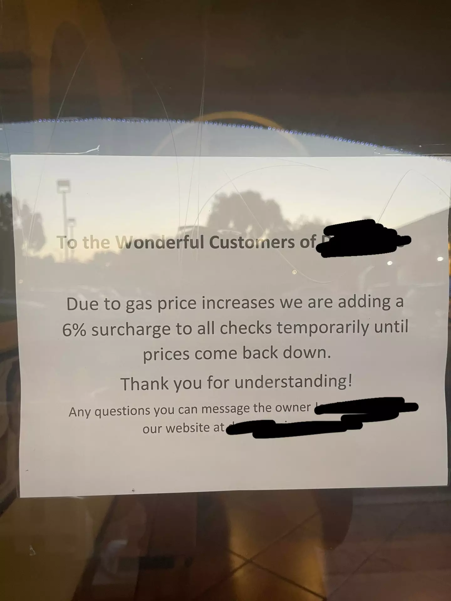 The sign in the restaurant window.