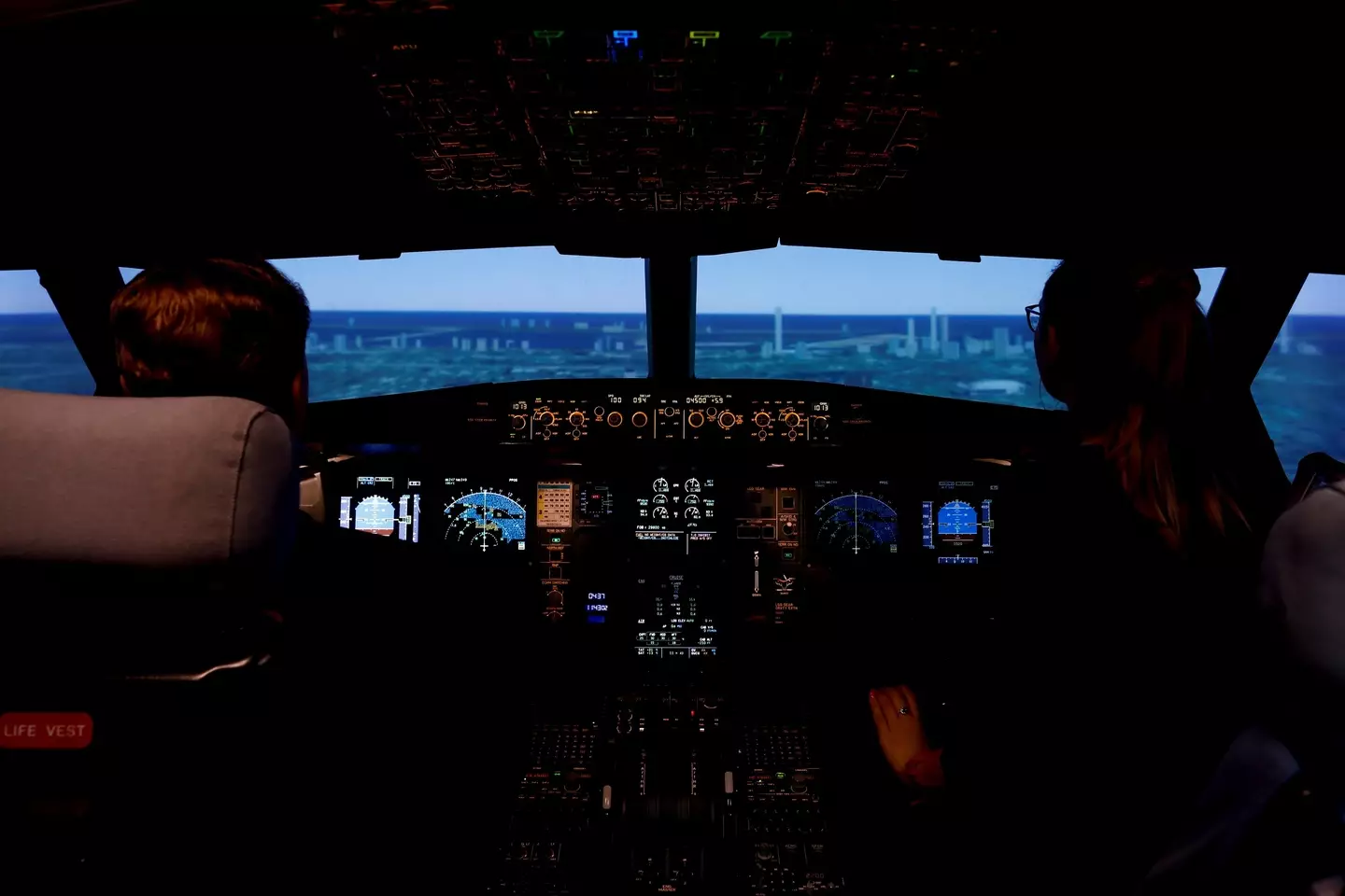 Yaroslav Vladimirovich Kudrinsky allowed his children to play with the plane's controls (Sefa Karacan/Anadolu Agency via Getty Images)